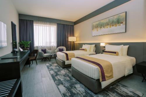 Deluxe Twin Room - 15% off on F&B shuttle to Deira City Center, Al Ghurair Mall & La Mer Beach del hotel Khalidia Palace Dubai. Foto 6