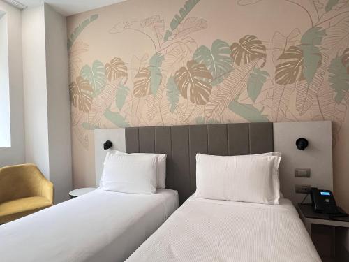Habitación Doble Estándar - 2 camas del hotel IH Hotels Milano Centrale. Foto 4