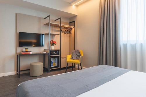 Habitación Doble Superior del hotel IH Hotels Milano Centrale. Foto 1