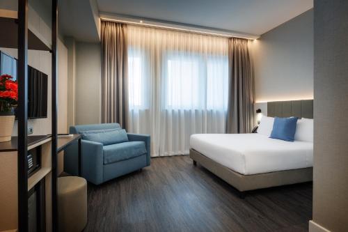 Habitación Doble Superior del hotel IH Hotels Milano Centrale. Foto 2