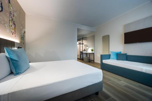 Habitación Doble Familiar del hotel IH Hotels Milano Centrale. Foto 3