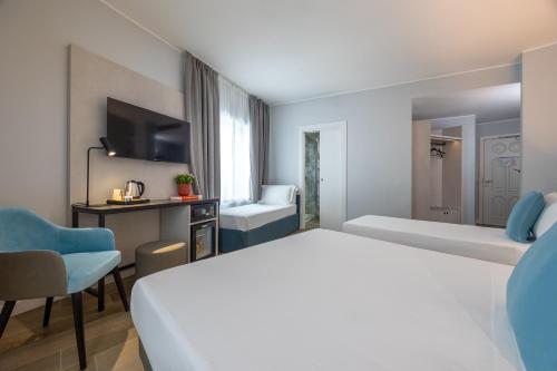 Habitación Doble Familiar del hotel IH Hotels Milano Centrale. Foto 5