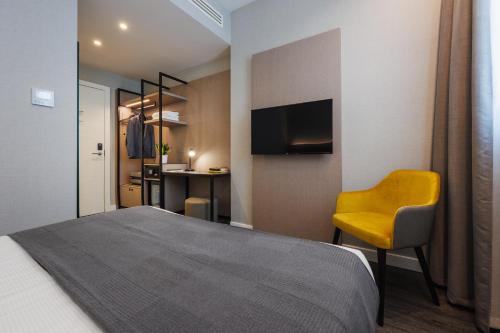 Habitación Individual Estándar del hotel IH Hotels Milano Centrale. Foto 3