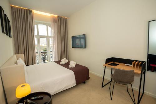 Habitación Doble - 1 o 2 camas del hotel Golden Lisbon. Foto 15