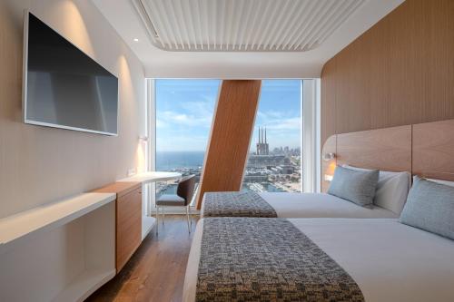 Habitación Doble Estándar con acceso al spa y vistas al mar del hotel Marina Badalona. Foto 5