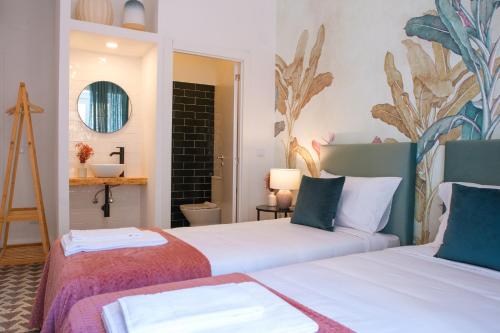 Habitación Doble - 2 camas del hotel Succeed Campo Pequeno Suites. Foto 3