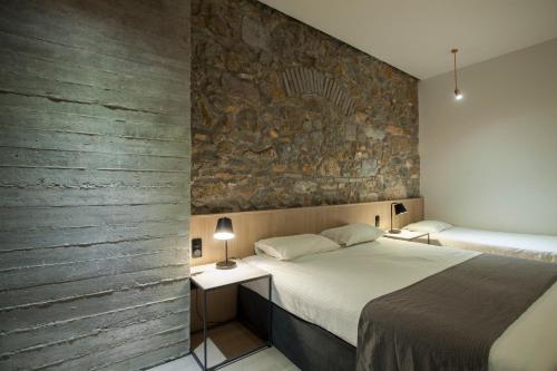 Habitación Triple del hotel Art Suites Korai. Foto 1