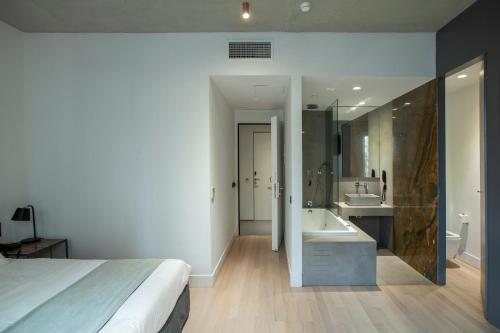 Habitación Triple del hotel Art Suites Korai. Foto 4