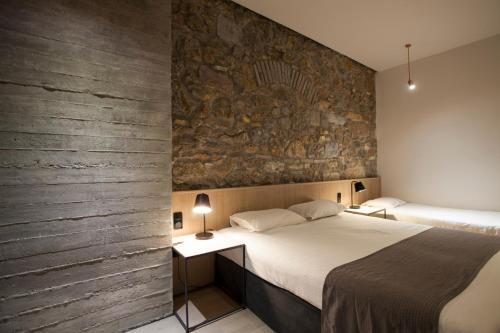 Habitación Triple del hotel Art Suites Korai. Foto 7
