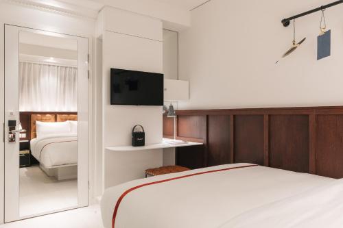 Nest Windowless Room del hotel Ruby Stella London. Foto 1
