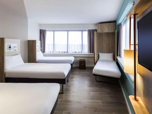 Habitación cuádruple del hotel Ibis Budget Amsterdam City South. Foto 2