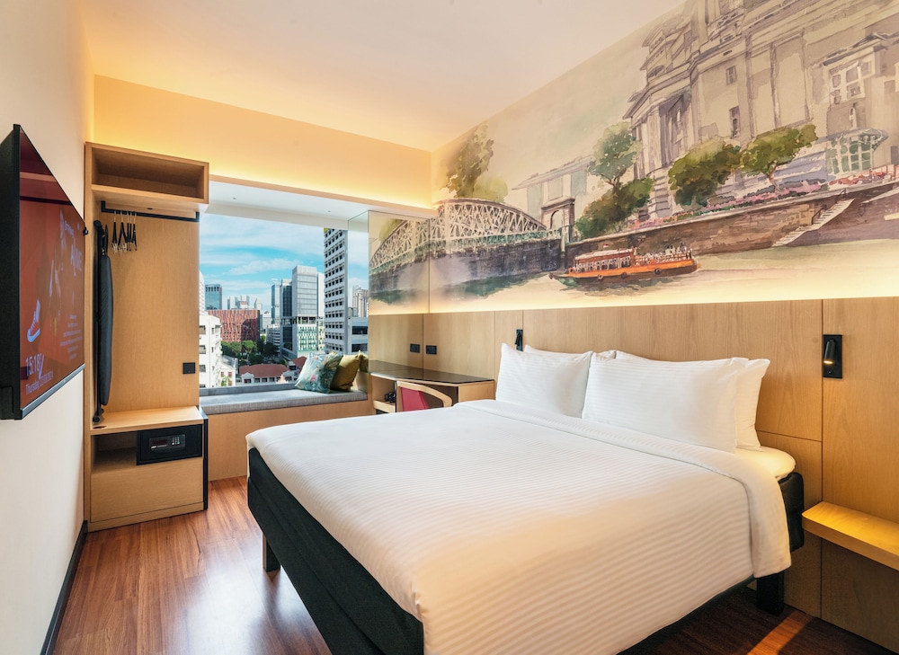Habitación Superior con cama king del hotel Ibis Singapore On Bencoolen. Foto 10