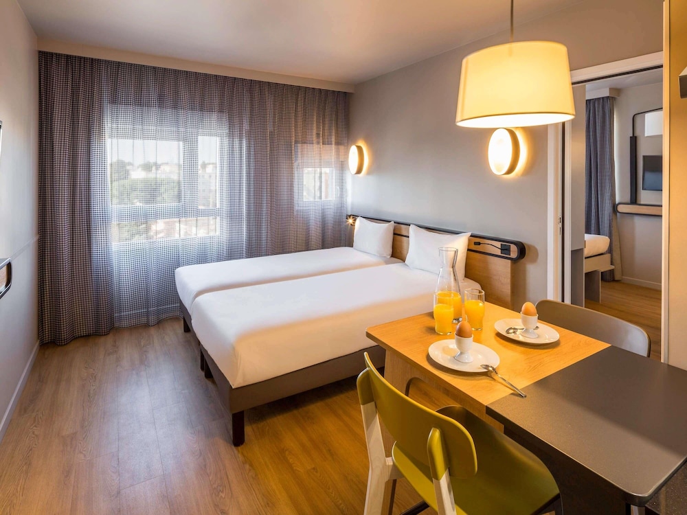 Estudio con camas individuales del hotel Adagio Access Montpellier Centre. Foto 2