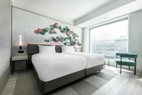 Habitación doble Deluxe - 2 camas - Planta estándar del hotel Centara Grand Osaka. Foto 4