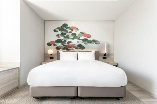 Habitación Deluxe - Cama extragrande - Planta Premium del hotel Centara Grand Osaka. Foto 5