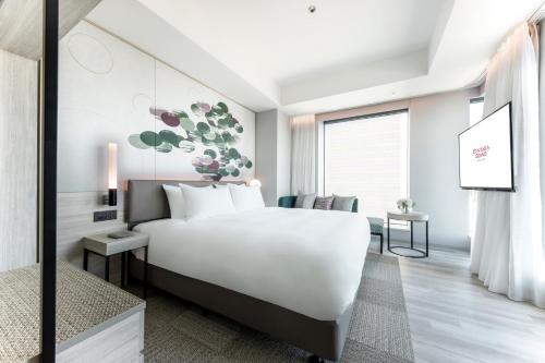 Habitación familiar - Planta estándar del hotel Centara Grand Osaka. Foto 4