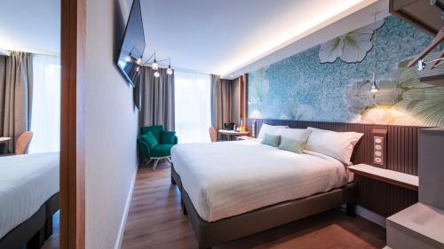 Suite con cama extragrande del hotel voco Strasbourg Centre - The Garden, an IHG Hotel