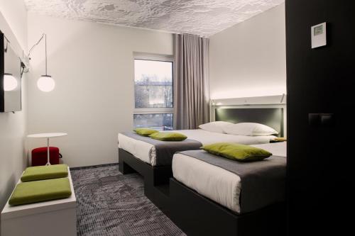 Habitación Triple del hotel ibis Tallinn Center. Foto 5