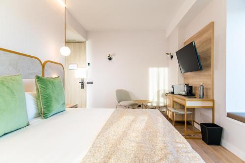 Habitación Deluxe con cama extragrande del hotel Málaga Vibes. Foto 5
