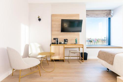 Habitación Deluxe con cama extragrande del hotel Málaga Vibes. Foto 6