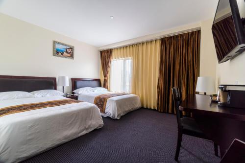 Habitación Doble Estándar del hotel John Hotel. Foto 3