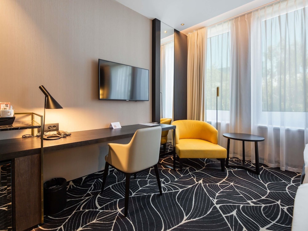 Habitación superior con 2 camas individuales del hotel Mövenpick Tallinn. Foto 3