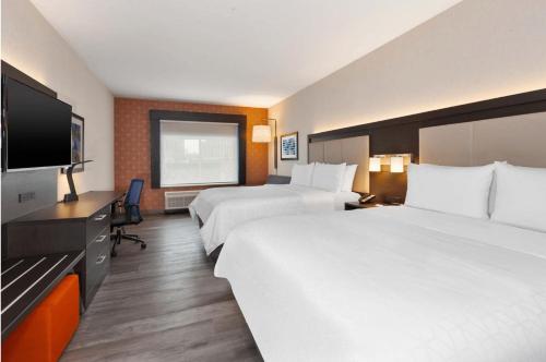 Suite con 2 camas dobles del hotel Holiday Inn Express and Suites Jersey City - Holland Tunnel. Foto 1