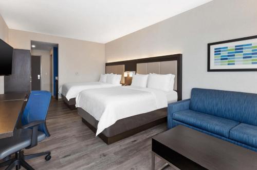 Suite con 2 camas dobles del hotel Holiday Inn Express and Suites Jersey City - Holland Tunnel. Foto 3