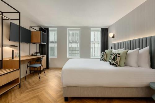 Habitación Confort del hotel H4 Wyndham Paris Pleyel Resort. Foto 3