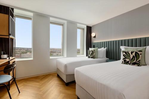 Habitación Doble Superior - 2 camas del hotel H4 Wyndham Paris Pleyel Resort. Foto 1