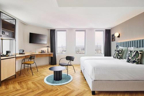 Deluxe Twin Room (High Floor) del hotel H4 Wyndham Paris Pleyel Resort. Foto 1