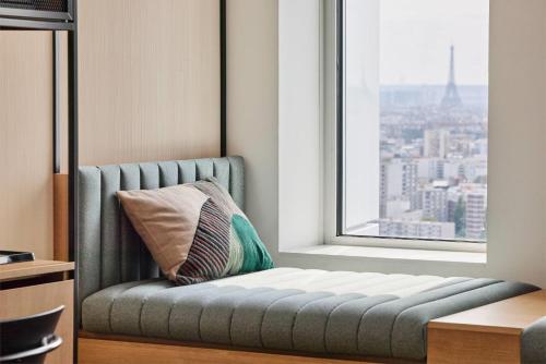Habitación triple familiar del hotel H4 Wyndham Paris Pleyel Resort. Foto 7