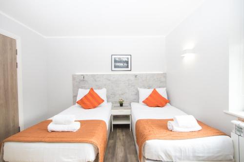Estudio Doble Deluxe - 2 camas del hotel Westciti Caroco. Foto 13