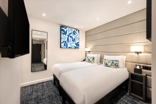 Habitación Doble Estándar sin ventanas - 2 camas del hotel voco London Marylebone by IHG