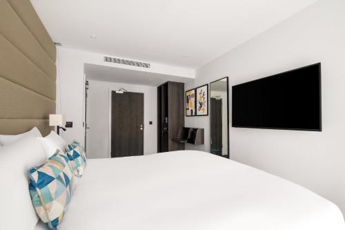 Habitación Acogedora con cama grande - Sin ventana del hotel voco London Marylebone by IHG. Foto 7