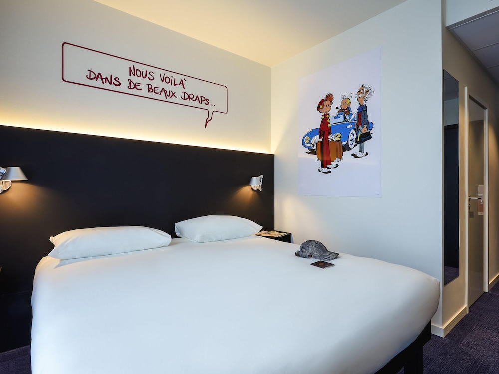 Habitación con 2 camas individuales del hotel ibis Styles Liege Guillemins. Foto 7