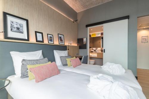 Habitación Doble Confort - 2 camas del hotel Postillion Hotel WTC Rotterdam. Foto 2