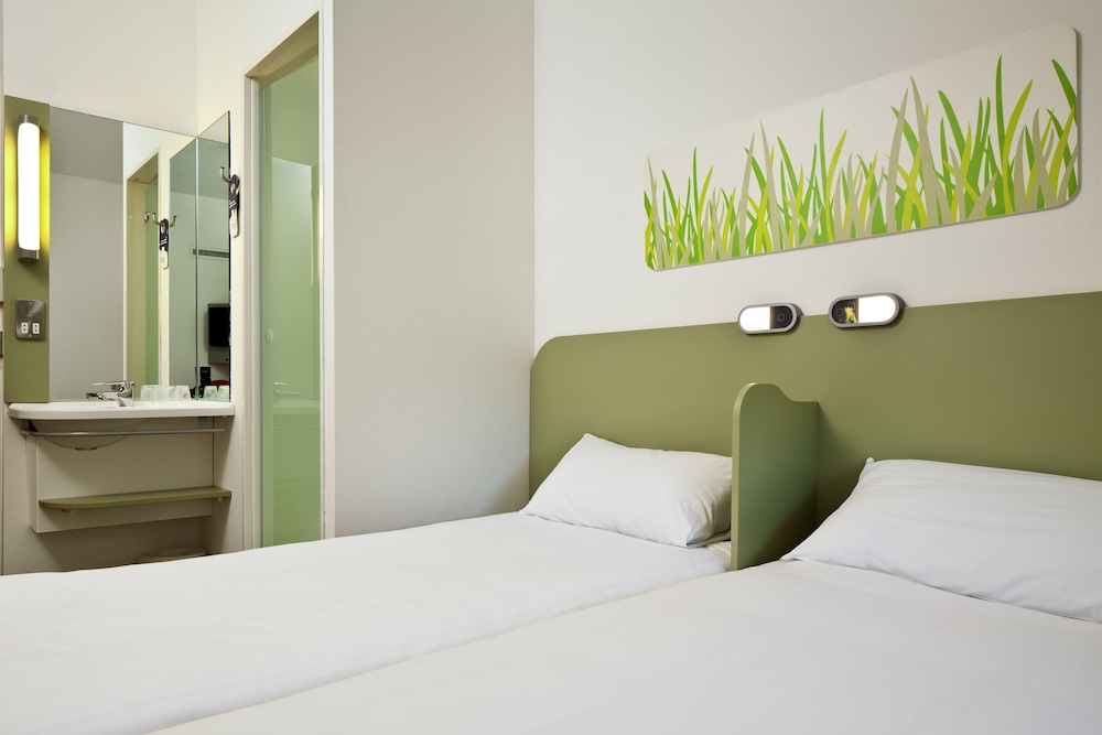 TWIN - Habitación con camas individuales del hotel Ibis Budget Manchester Centre Pollard Street. Foto 1