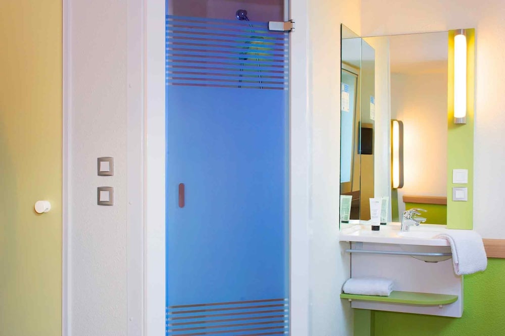 TWIN - Habitación con camas individuales del hotel Ibis Budget Manchester Centre Pollard Street. Foto 3