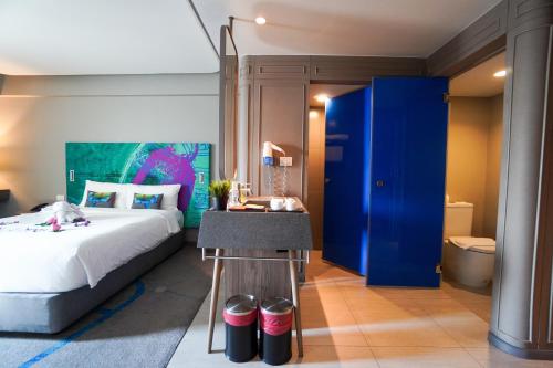 Habitación Comunicada Familiar del hotel Tinidee Trendy Bangkok Khaosan. Foto 1