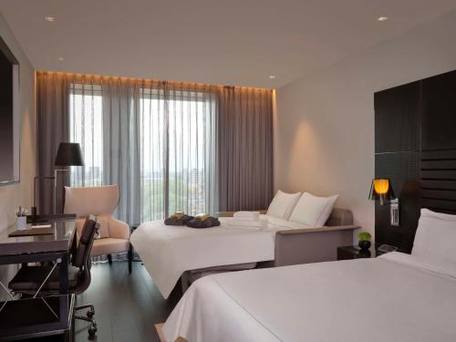 Estudio Art - 2 camas individuales del hotel Art’otel London Hoxton. Foto 2