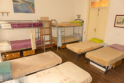 Cama en habitación compartida mixta - 12 camas del hotel La Casa Encantada. Foto 4