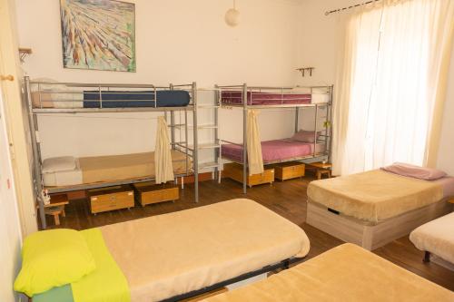Cama en habitación compartida mixta - 12 camas del hotel La Casa Encantada. Foto 1