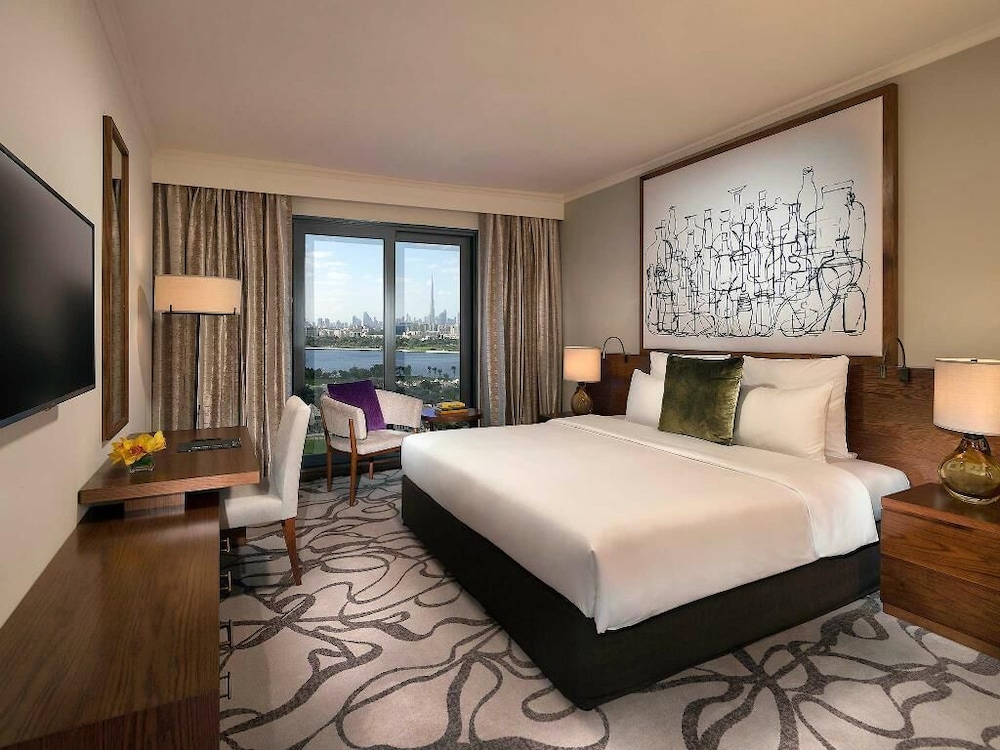 Apartamento de 2 dormitorios, 1 cama king size y 2 camas individuales, vistas al arroyo del hotel Pullman Dubai Creek City Centre Residences. Foto 7