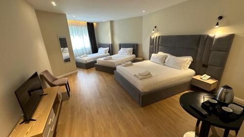 Habitación Cuádruple Deluxe del hotel Granda. Foto 1