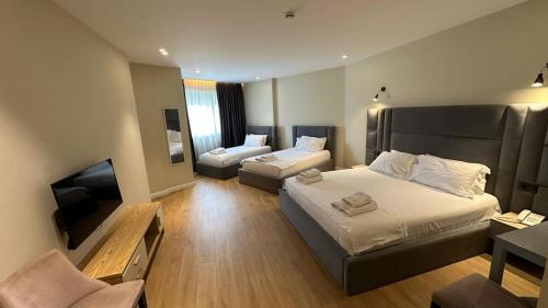 Habitación Cuádruple Deluxe del hotel Granda. Foto 4