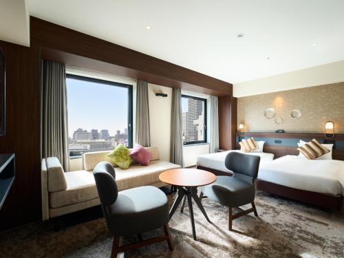 Habitación Doble Deluxe con acceso al salón - 2 camas - No fumadores del hotel Elcient Osaka