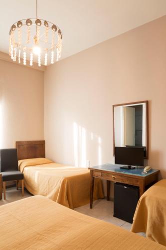 Habitación cuádruple del hotel Panorama. Foto 5