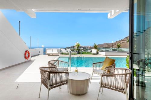 Apartamento con vistas a la piscina del hotel Palmera Sea View. Foto 5