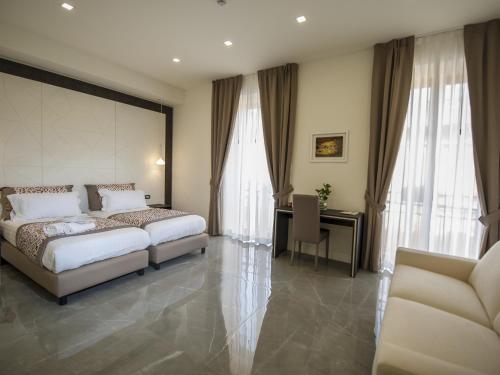 Habitación Doble Superior con Balcón del hotel Palazzo Firenze. Foto 1